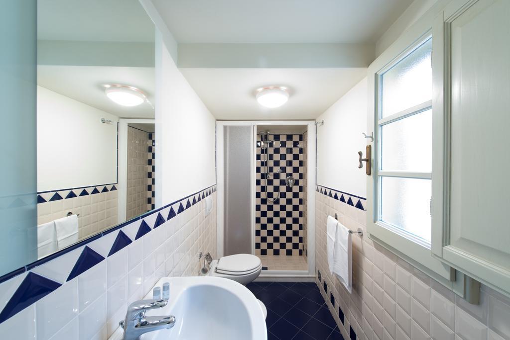 ホテル Palazzo Piazza Mazzini ペーシャ 部屋 写真